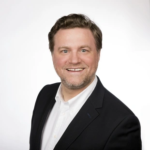 Portrait von Herrn Dennis Witthus, Geschäftsführer