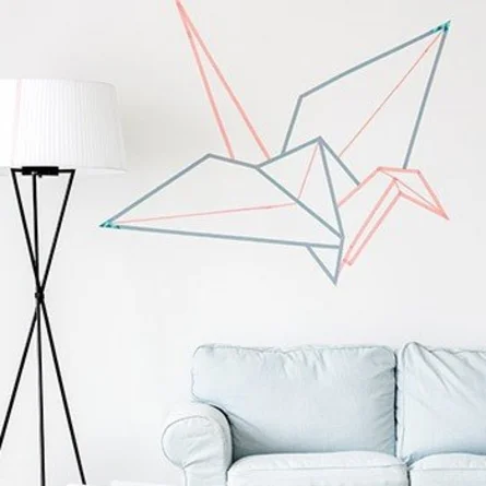 variable Dekoration - Wanddeko zum aufkleben auf die Tapete, hier ein graphischer Vogel, origami Kranich.